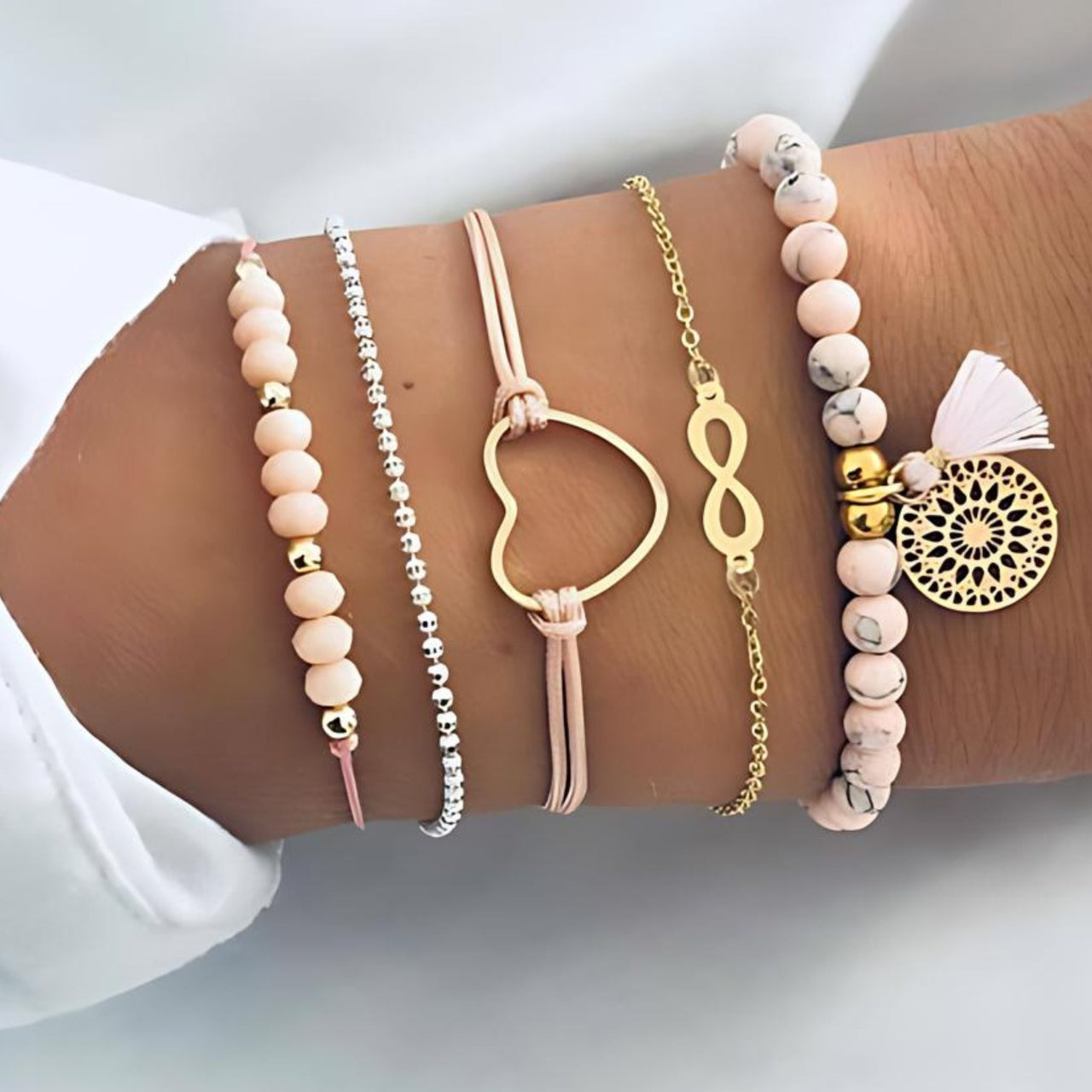 Introducing our Boho Infinity 5 Piece Bracelet and Bangle Sets, perfect for the vibrant seasons of spring and summer