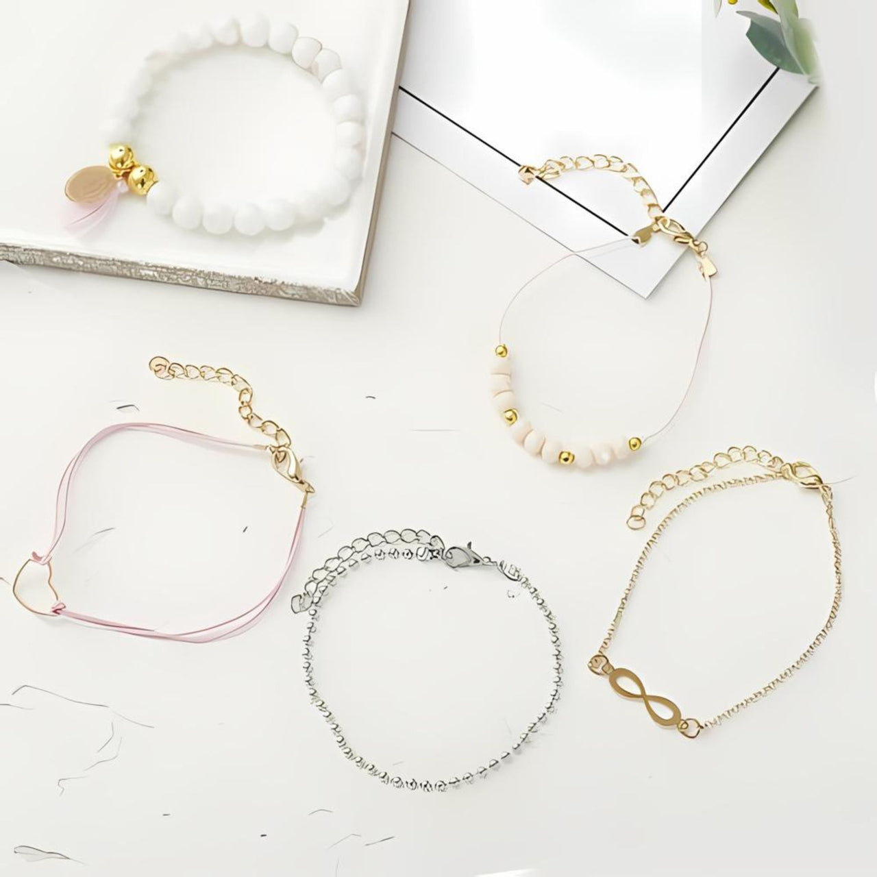 Introducing our Boho Infinity 5 Piece Bracelet and Bangle Sets, perfect for the vibrant seasons of spring and summer